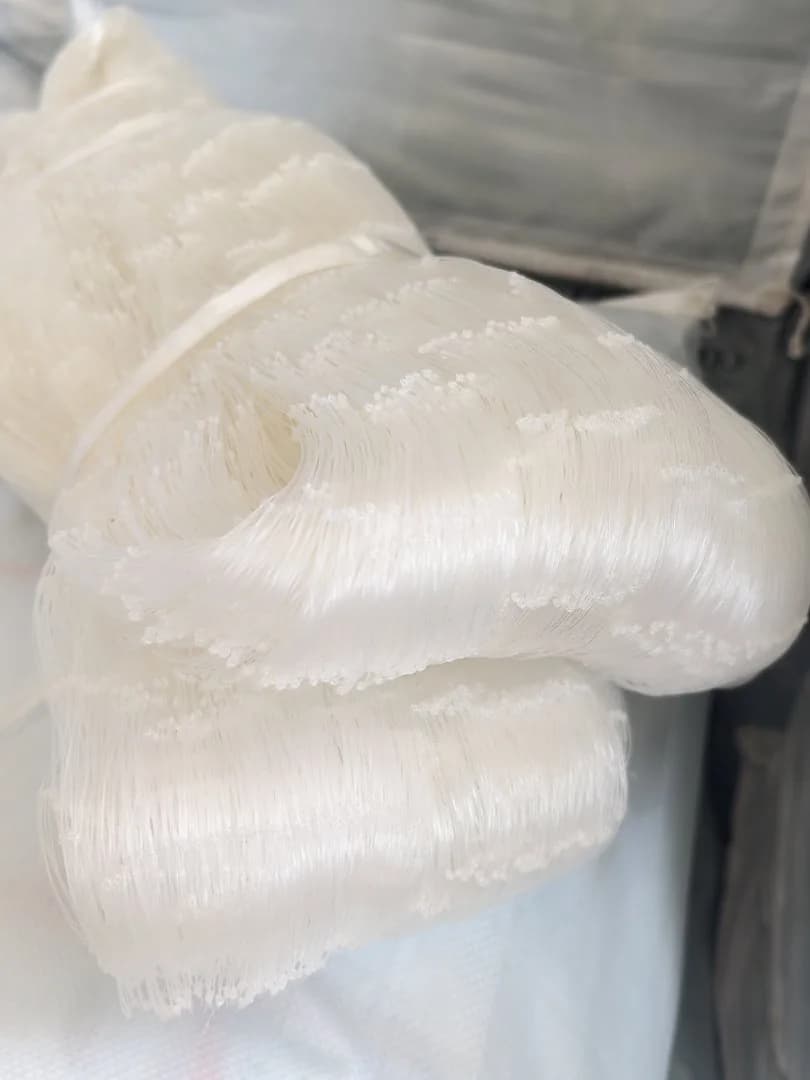 Close view of white nylon monofilament fishing net